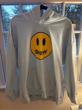 drew house Light Blue Hoodie with Yellow Smiley Logo